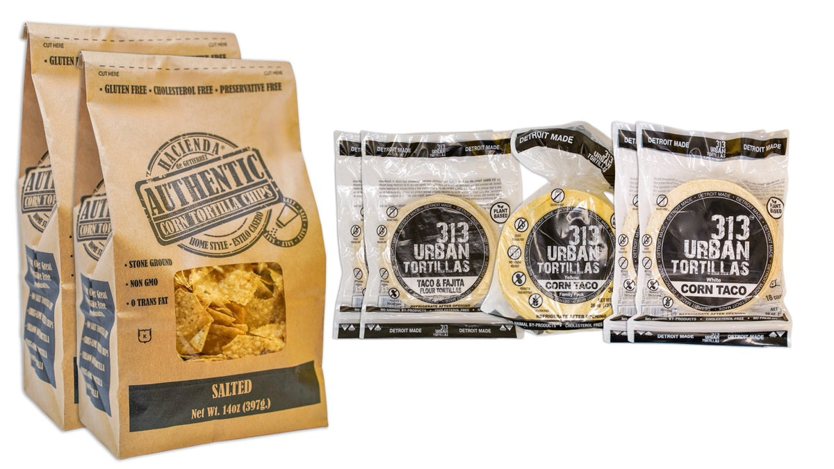 Image: A display featuring two bags of Authentic Salted tortilla chips on the left. To the right, there are two bags of 313 Urban 6" Flour Tortillas, one bag of 313 Urban Yellow Corn Tortillas, and two bags of 313 Urban White Corn Tortillas, all labeled "Detroit Made."